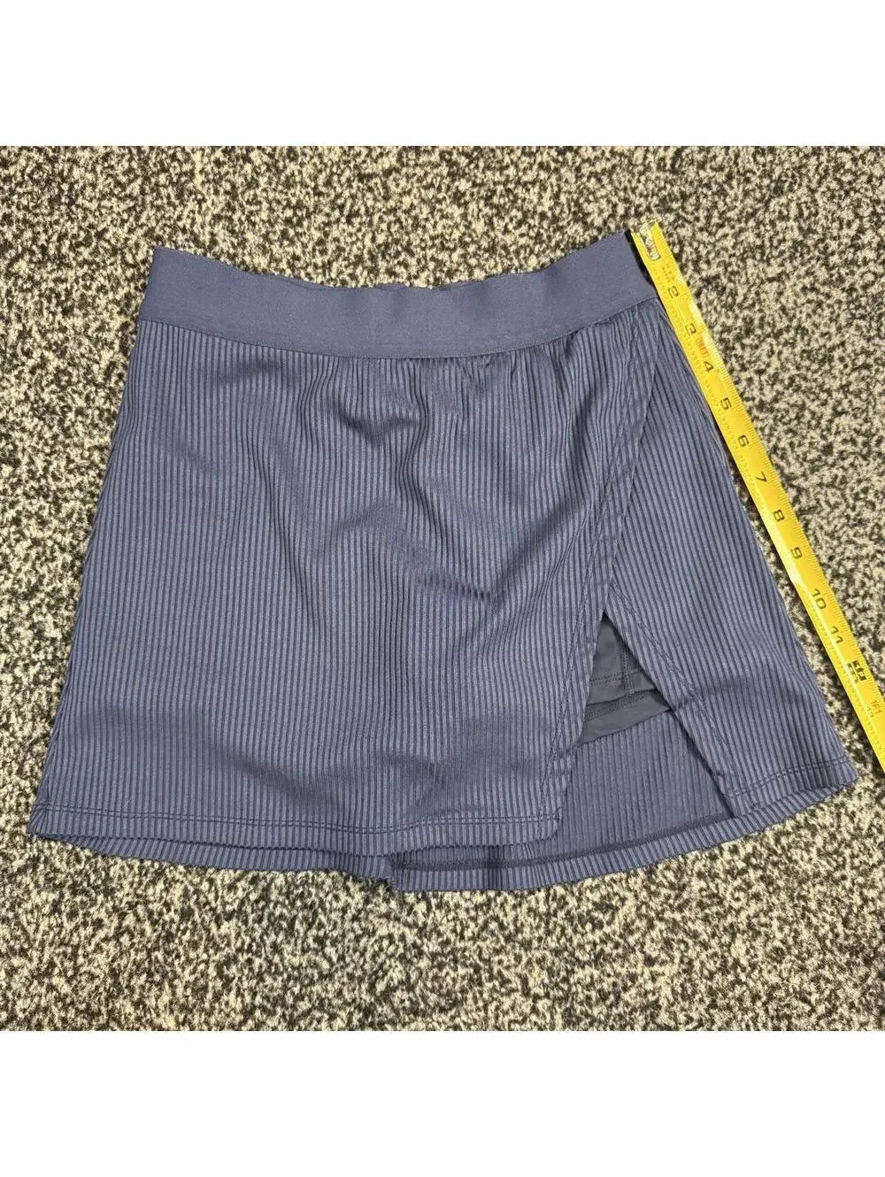 Navy blue mini skirt with thin vertical stripes